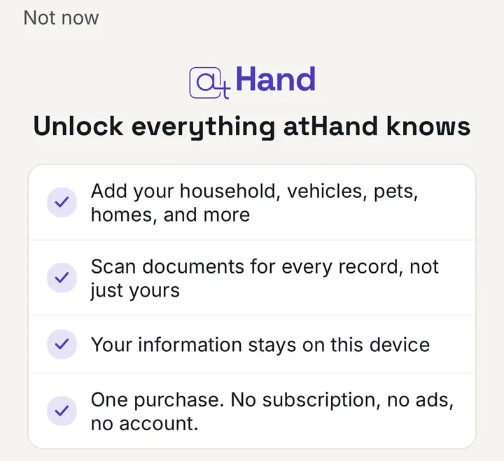 The atHand unlock screen, headed “Unlock everything atHand knows.” Its list reads: add your household, vehicles, pets, homes, and more; scan documents for every record, not just yours; your information stays on this device; one purchase, no subscription, no ads, no account.